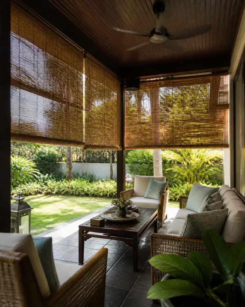 Outdoor Blinds for Malaysia — bamboo-look outdoor roll-down blinds shading an alfresco patio